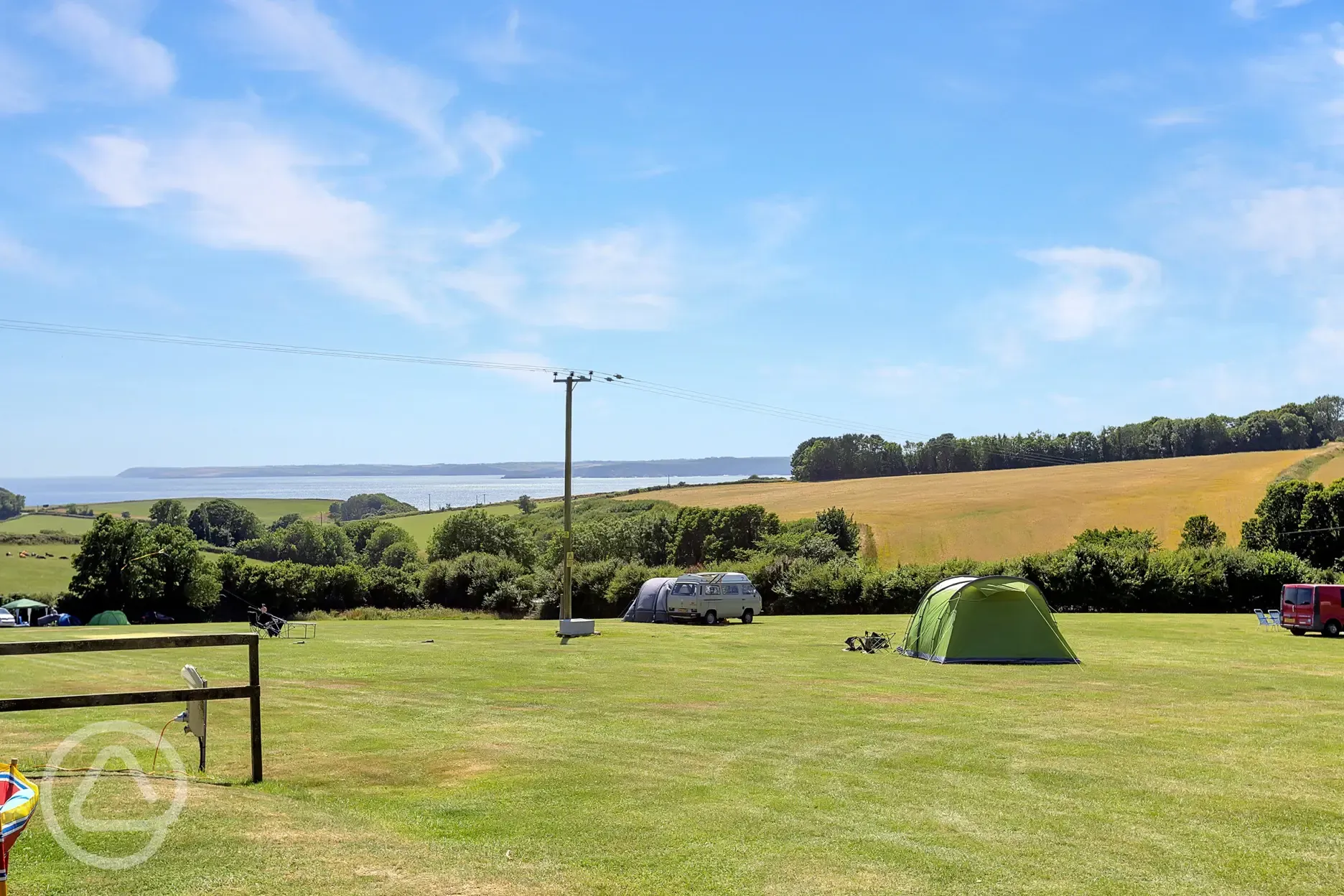 Non electric grass pitches for tents and tourers overlooking St Austell Bay