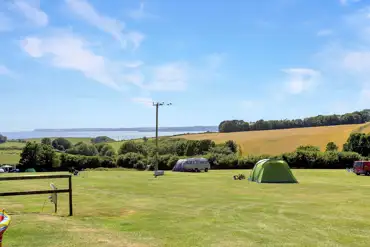 Non electric grass pitches for tents and tourers overlooking St Austell Bay