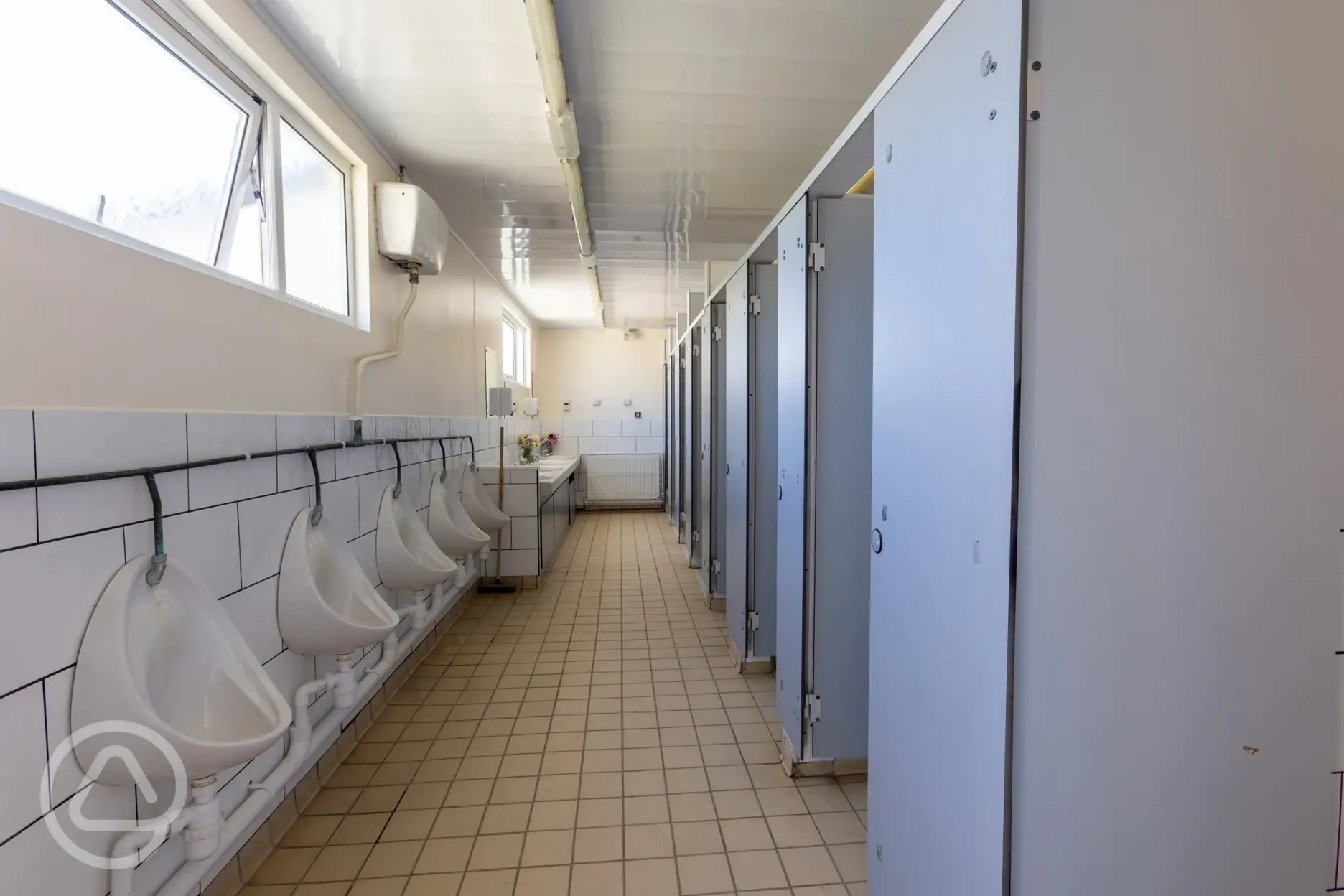 Toilets with urinals