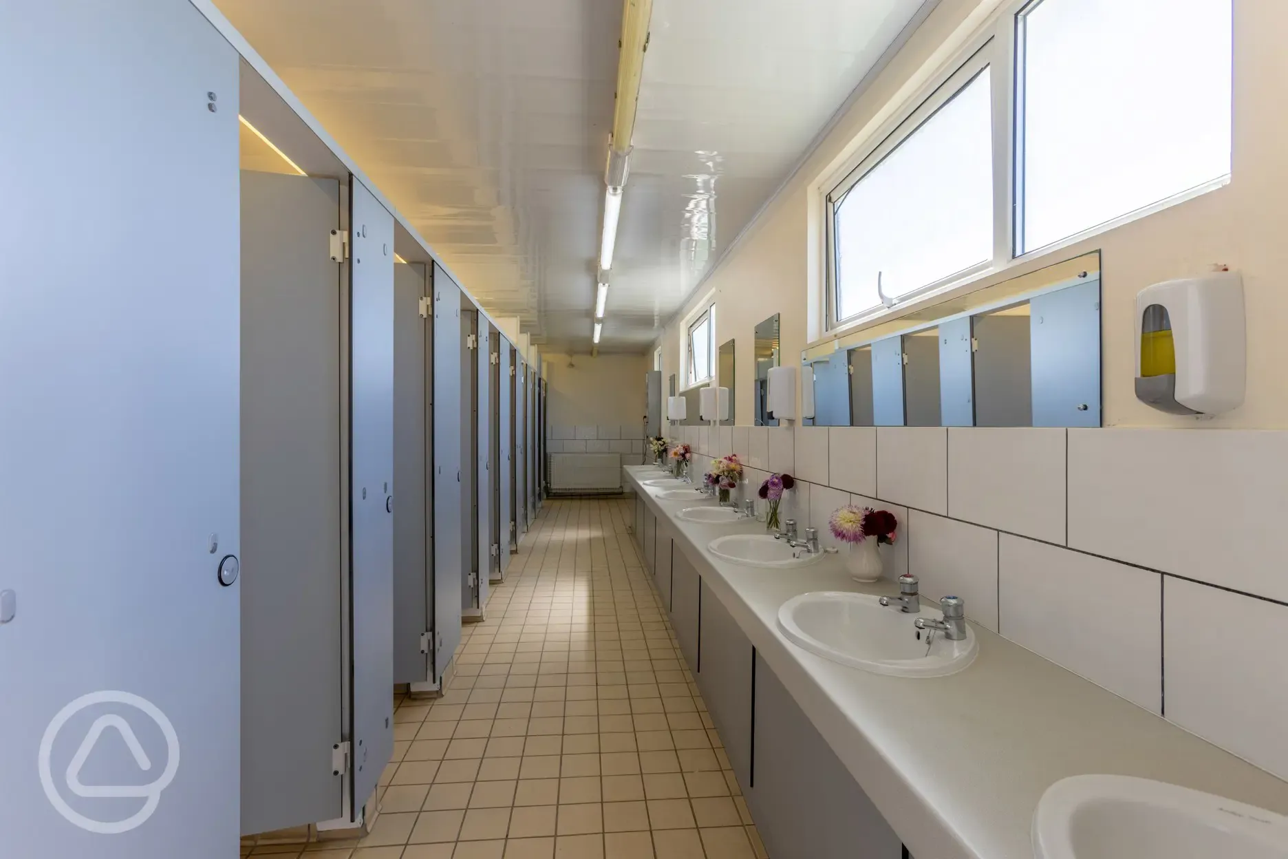 Private toilet cubicles and handwashing sinks