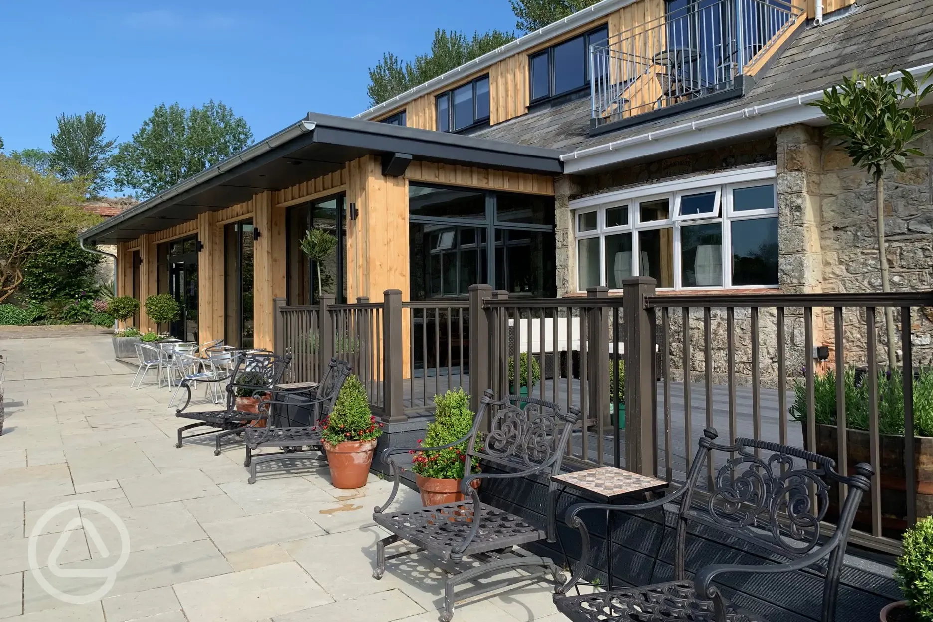 Outdoor cafe seating area beside the swimming pool Outdoor cafe seating area beside the swimming pool