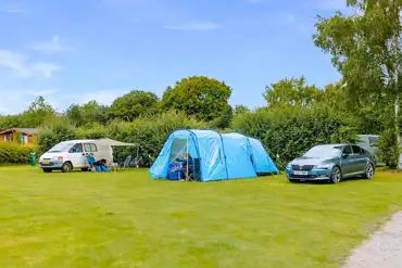 Large electric grass pitches for tents, caravans, motorhomes and trailer tents