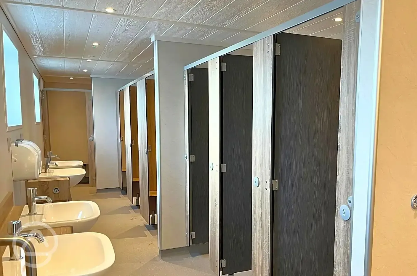 Toilets and showers with sinks