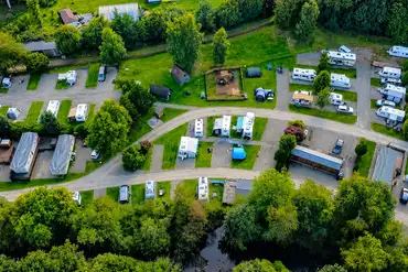 Aerial of Black Rock Caravan and Camping Park with a play park