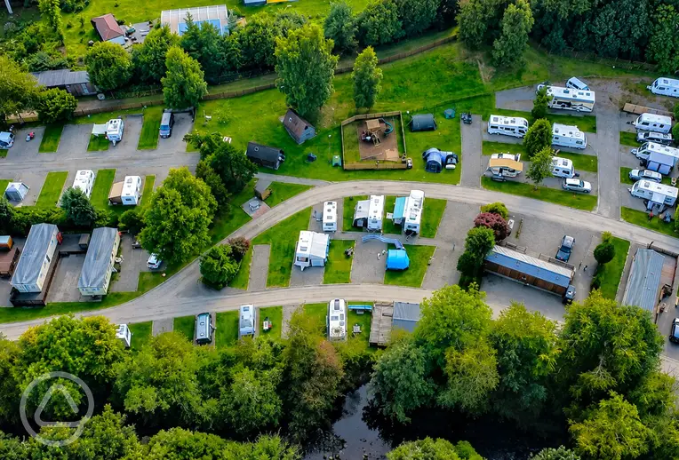 Aerial of Black Rock Caravan and Camping Park with a play park