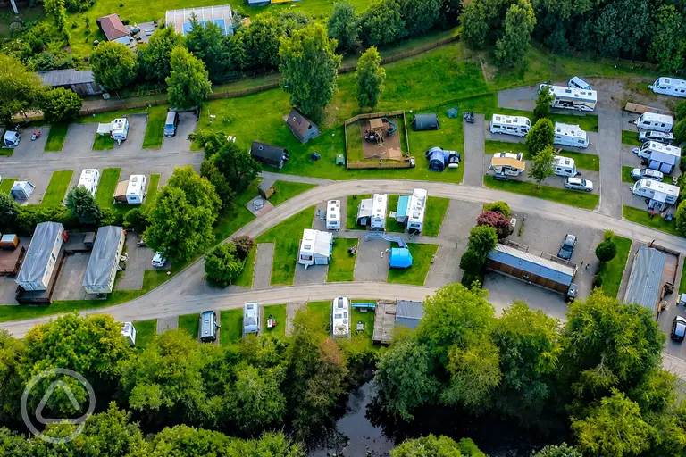 Aerial of Black Rock Caravan and Camping Park with a play park