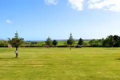 Electric grass pitches (10m x 10m) with 10 amp hook ups Electric grass pitches (10m x 10m) with 10 amp hook ups
