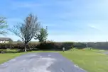 Grass and hardstanding touring pitches with 10 amp electric hook ups