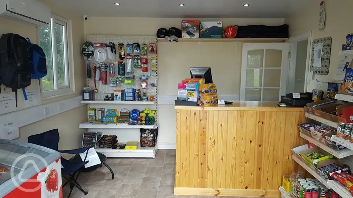 Onsite shop selling camping equipment and essential items