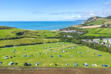Big Berries non electric grass pitches with sea views at Golden Cap Holiday Park