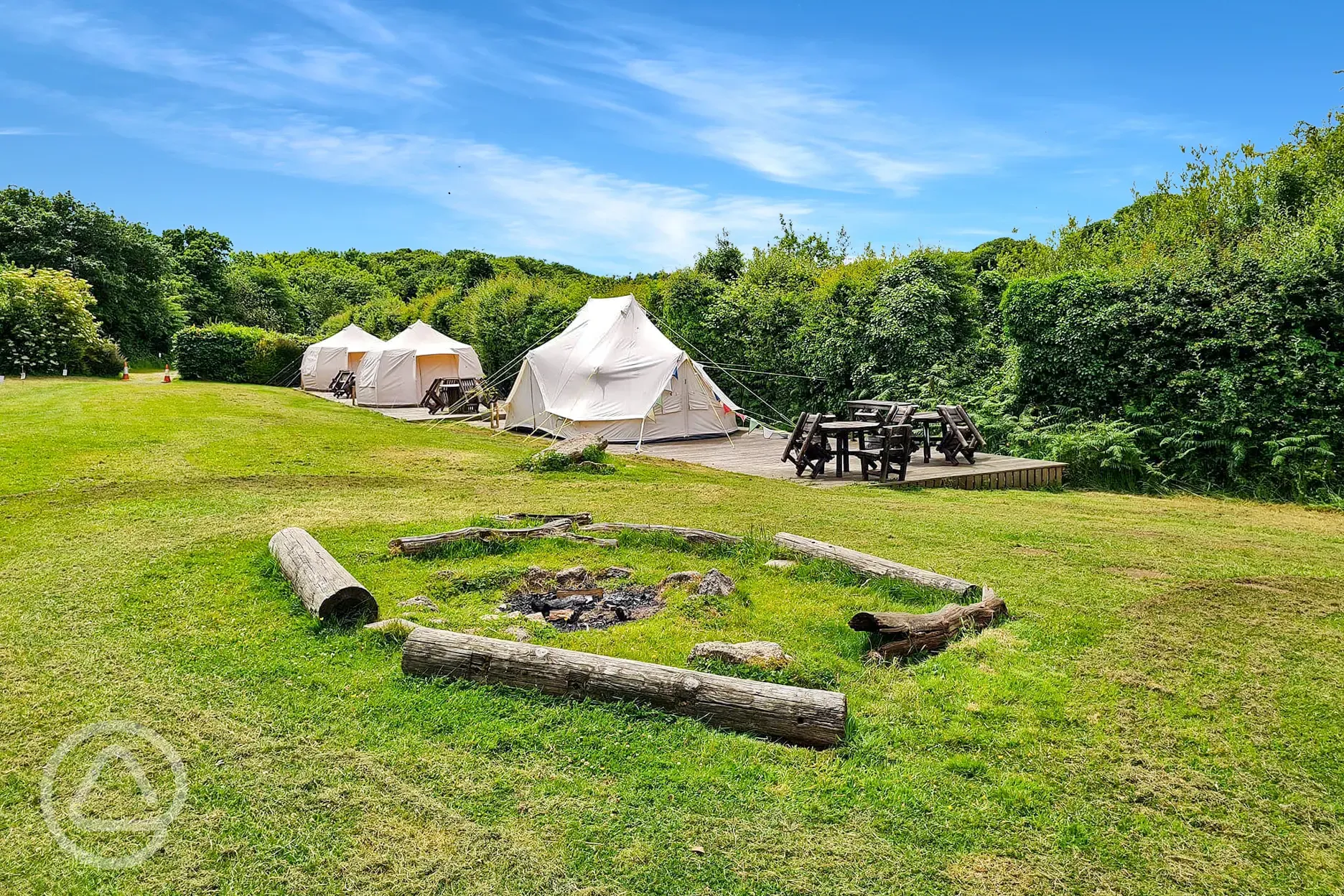 Communal fire pit and bell tents