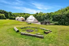 Communal fire pit and bell tents