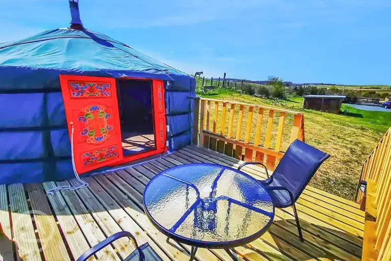 Yurt with decking and outdoor furniture 