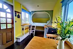 Bluebell interior with a double bed and furniture Bluebell interior with a double bed and furniture