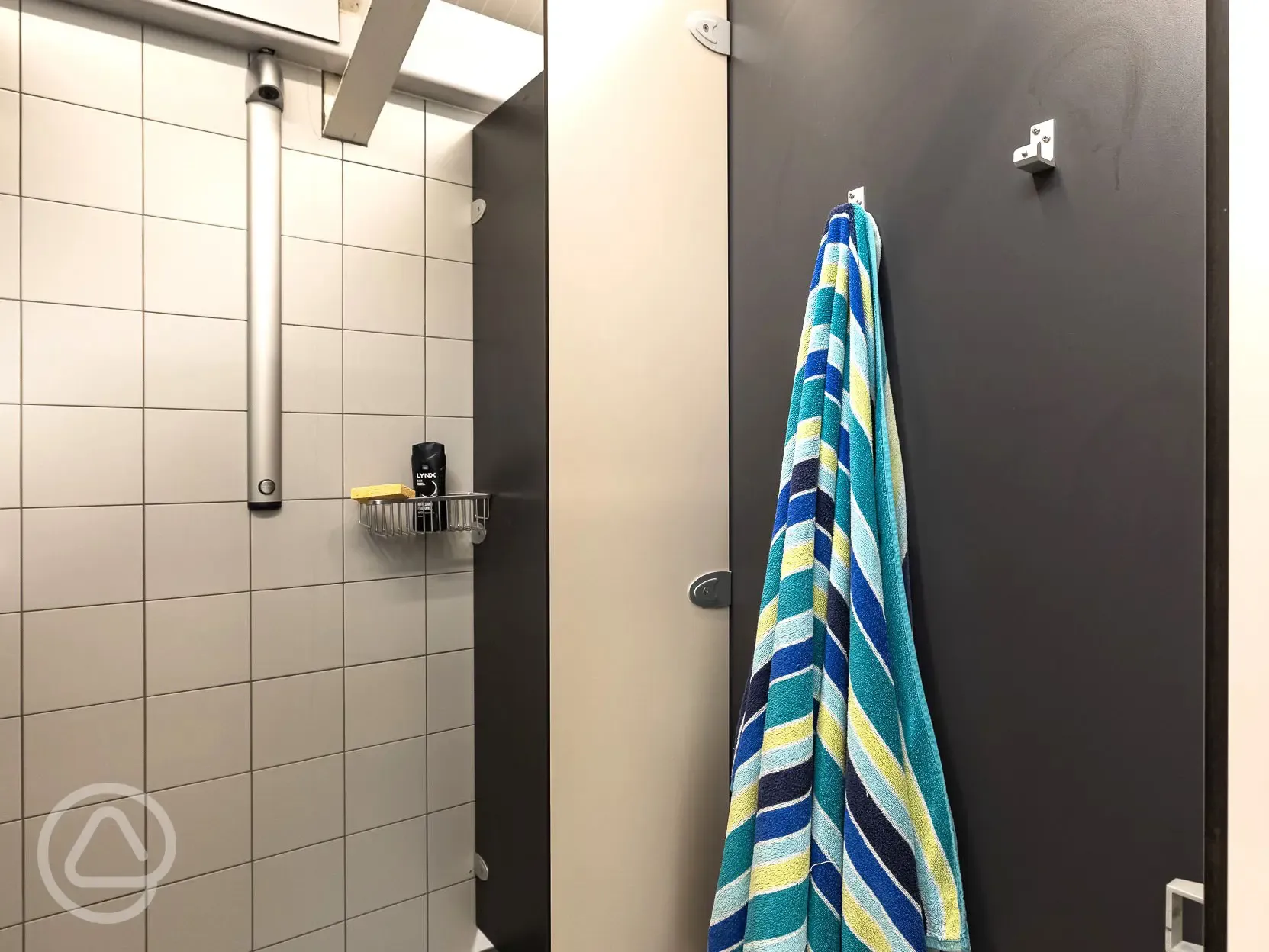 Showers with a changing area including hooks and mini benches