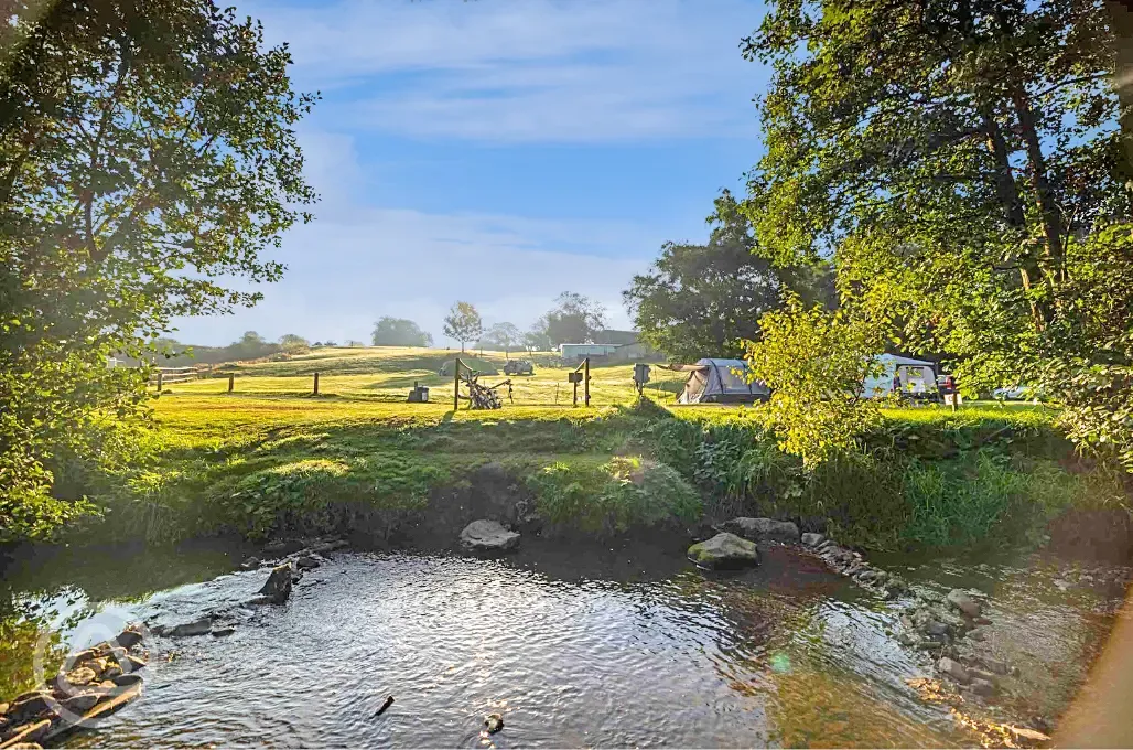 Hardstanding pitches with views of the River Manifold