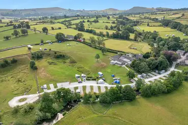 Aerial view of Bank House Farm and the surrounding Peak District countryside
