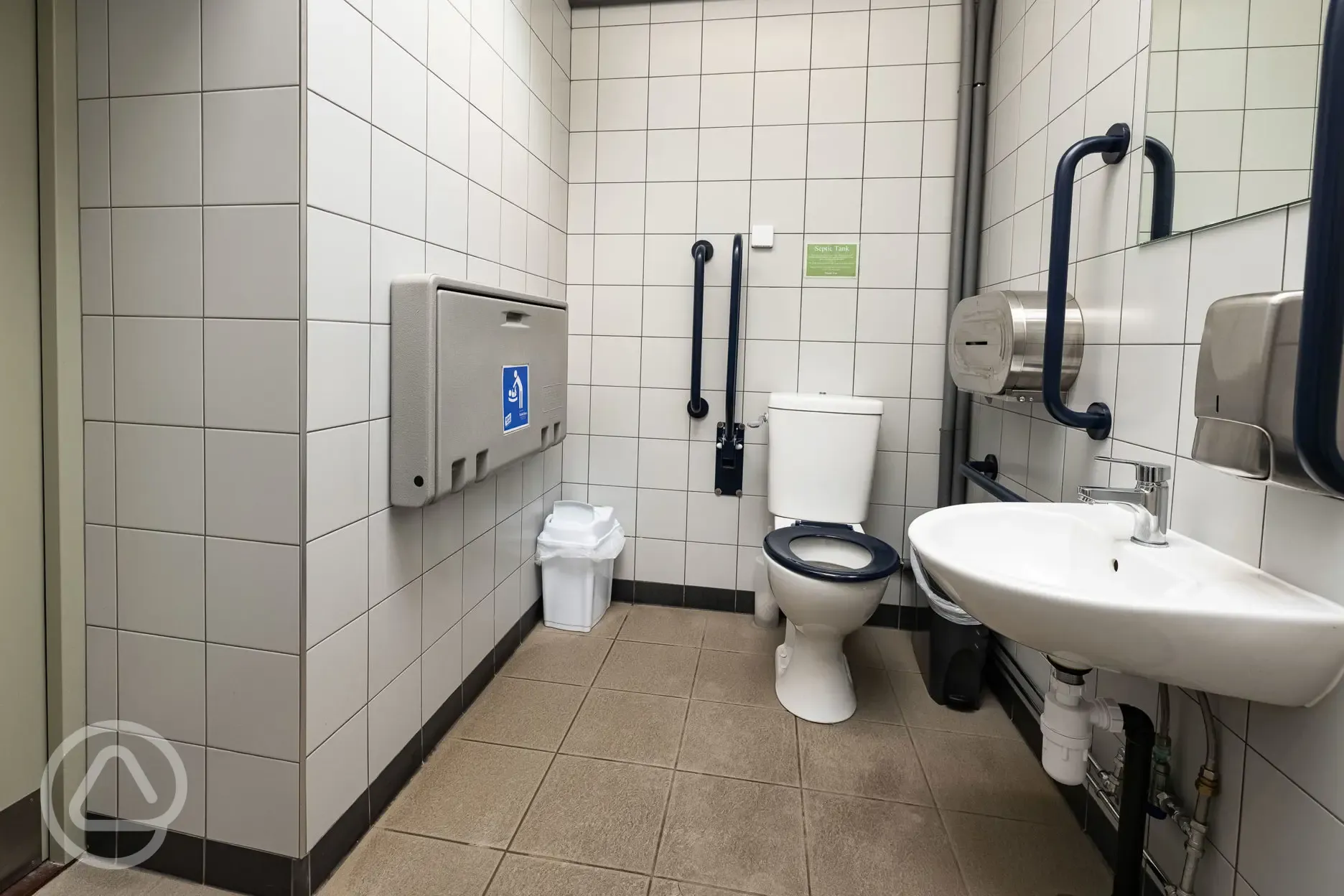 Accessible/family bathroom with grab rails and baby changing