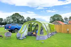 Large grass pitch for units up to 8m x 6m with optional electric