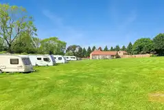 Optional electric grass touring pitches in the main camping field
