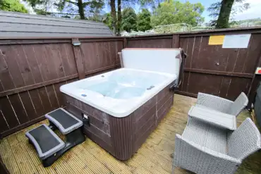 Pods include private electric hot tubs