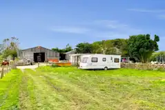 Caravan on an electric grass pitches Caravan on an electric grass pitches