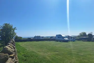 Grass pitches at Bent Rigg Farm Campsite