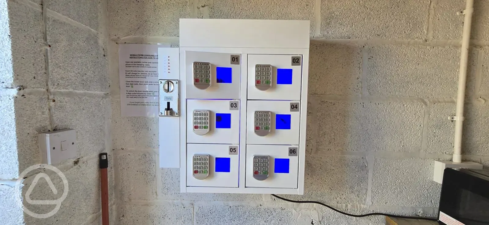 Coin operated mobile phone charging unit
