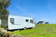 Caravan on an electric grass pitch at Bent Rigg Caravan on an electric grass pitch at Bent Rigg