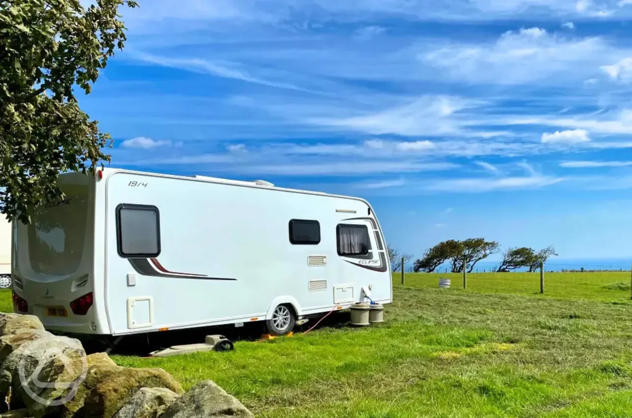 Electric grass pitches and sea views