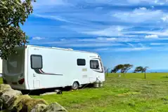 Electric grass pitches and sea views Electric grass pitches and sea views