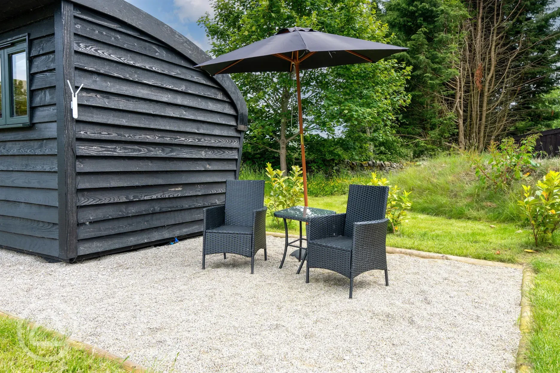 Meadow View glamping cabin outdoor seating area