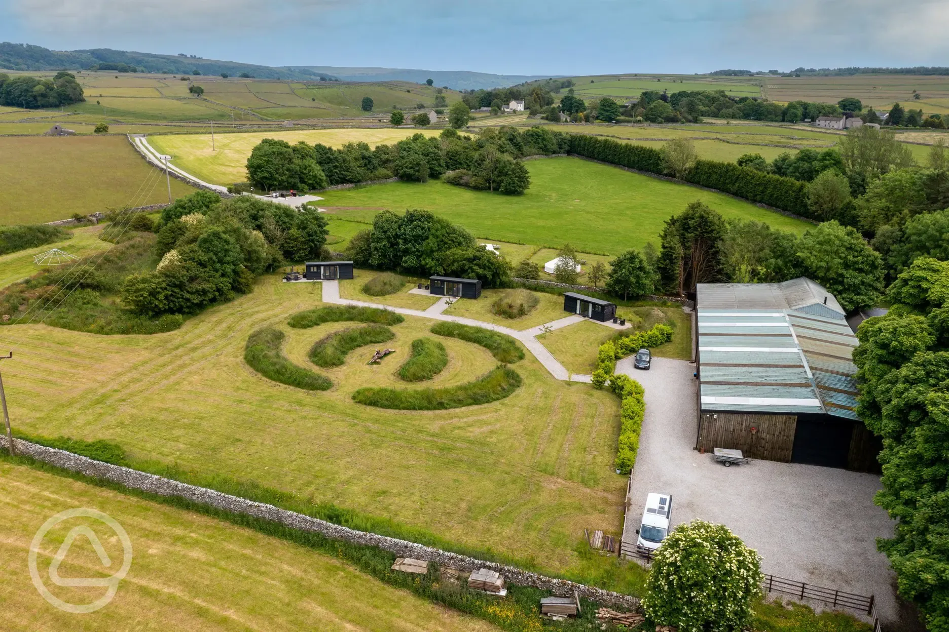 Aerial of the glamping cabins