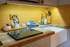 Digby's Hut lit kitchen area