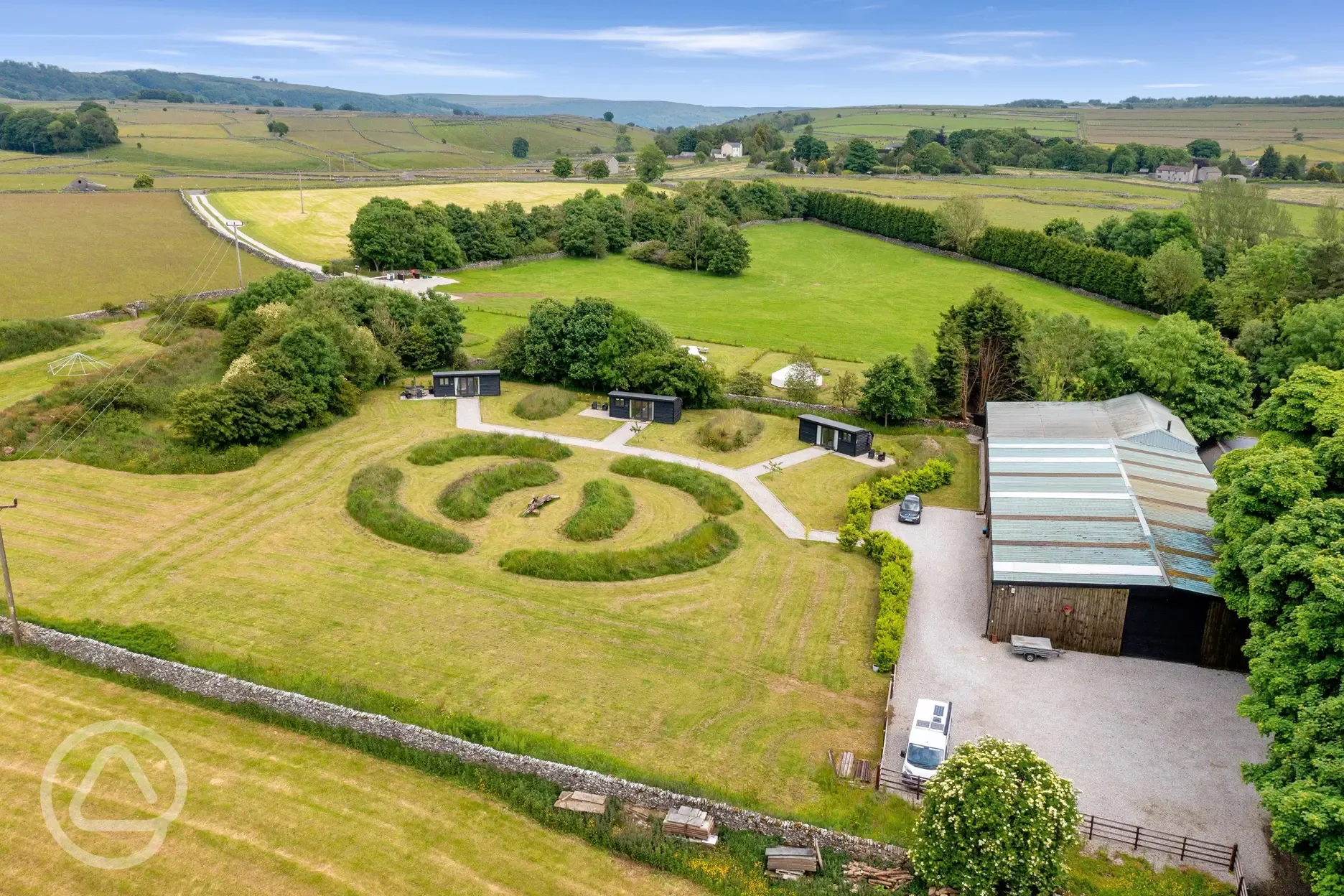 Aerial of the glamping cabins