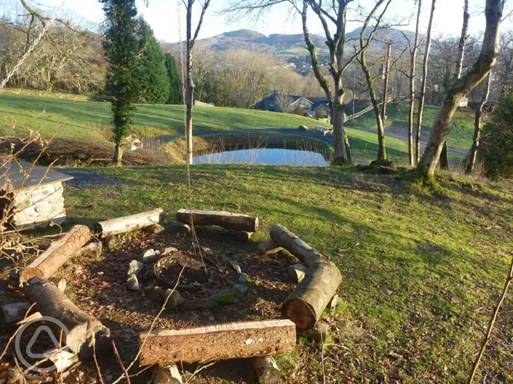Fire pit at Bryn Y Gwin Farm Caravan and Campsite