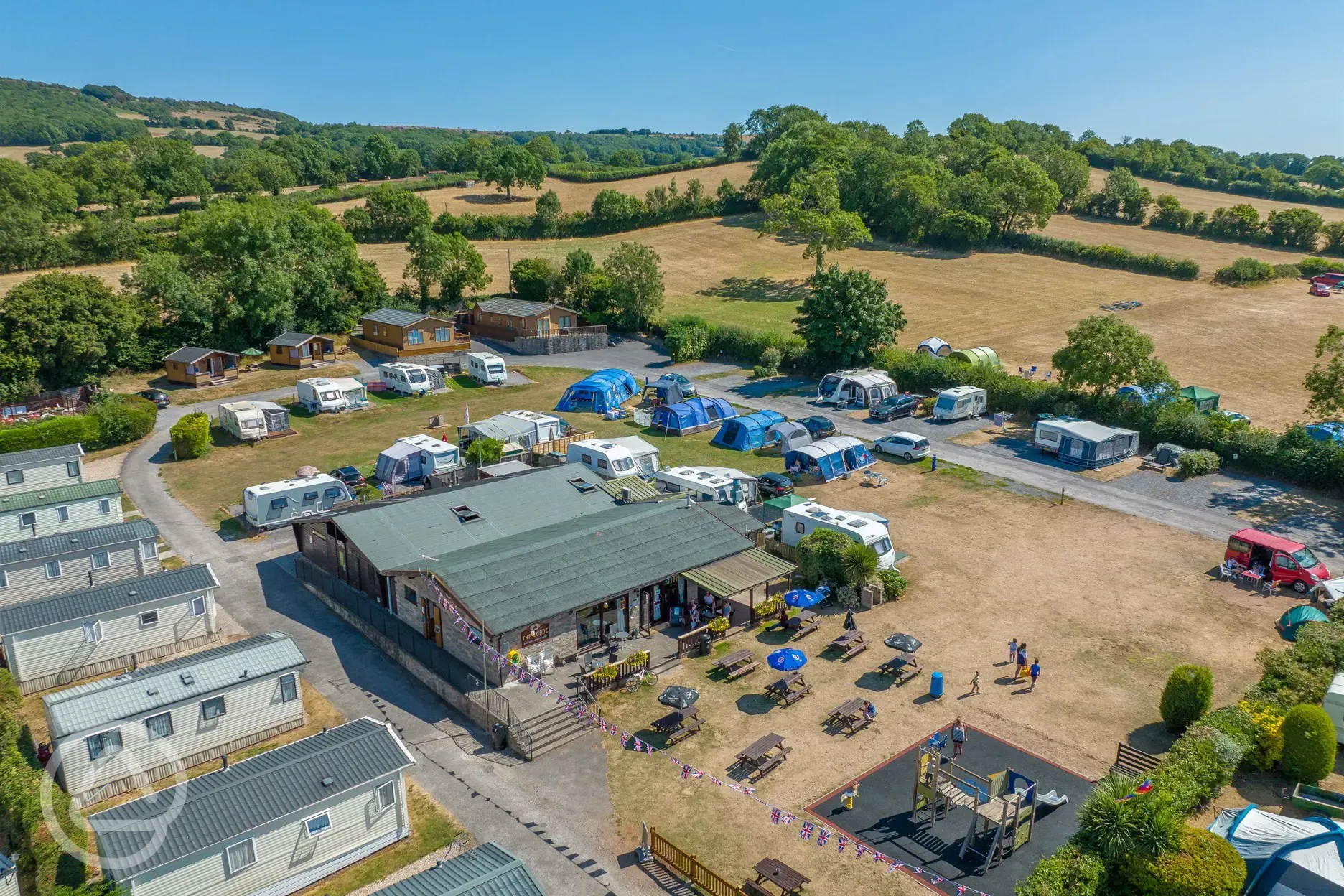 Aerial of the campsite with Lodge Bar, Grill and Restaurant and play park