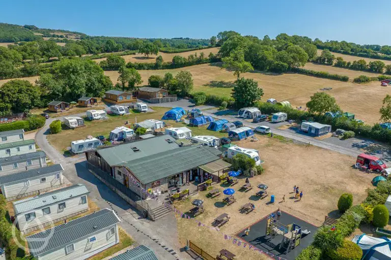 Aerial of the campsite with Lodge Bar, Grill and Restaurant and play park