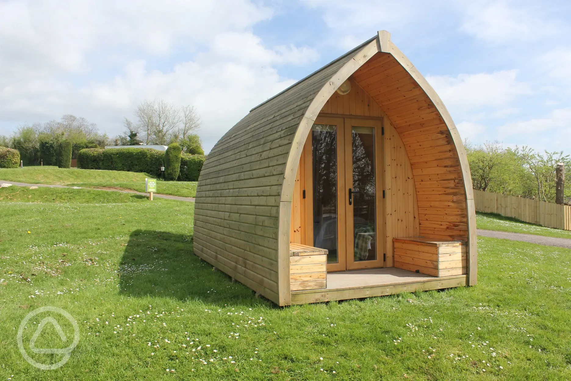 Camping pod with a double bed and two single beds