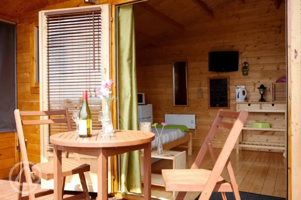 Camping cabin outdoor seating area