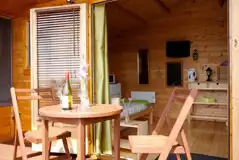 Camping cabin outdoor seating area