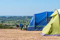 Non electric grass tent pitches