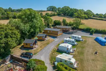 Aerial of hardstanding pitches and static caravans
