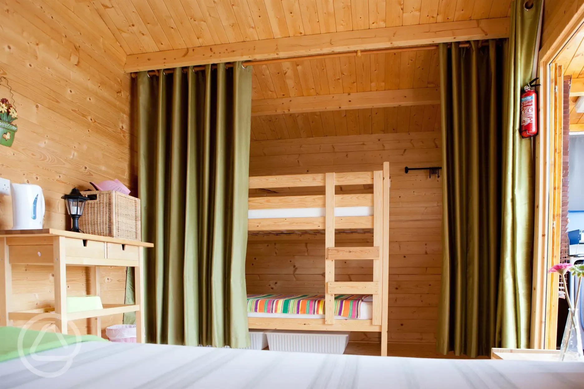 Camping cabin bunk beds (bedding not provided)