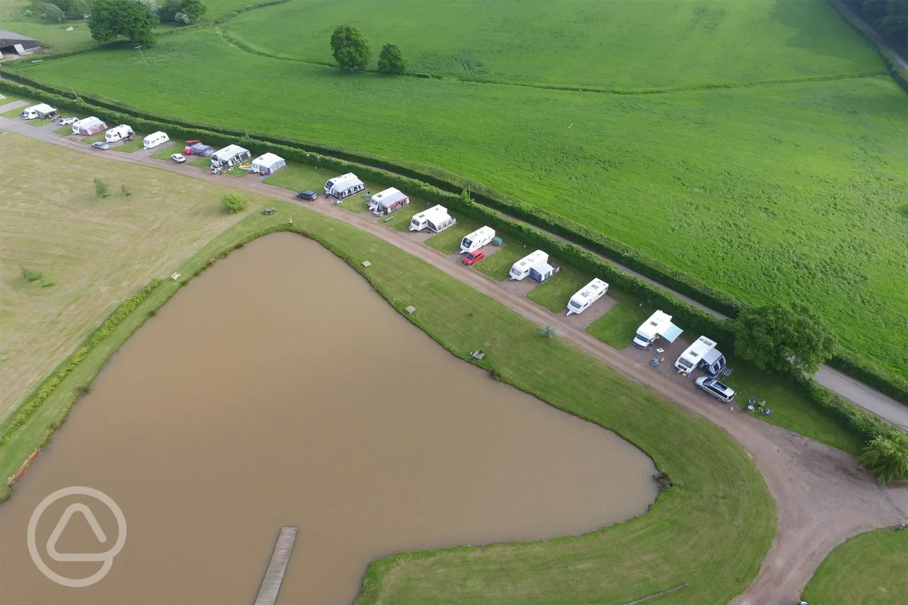 Aerial of the fully serviced hardstanding touring pitches