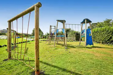 Children's play area with climbing structures