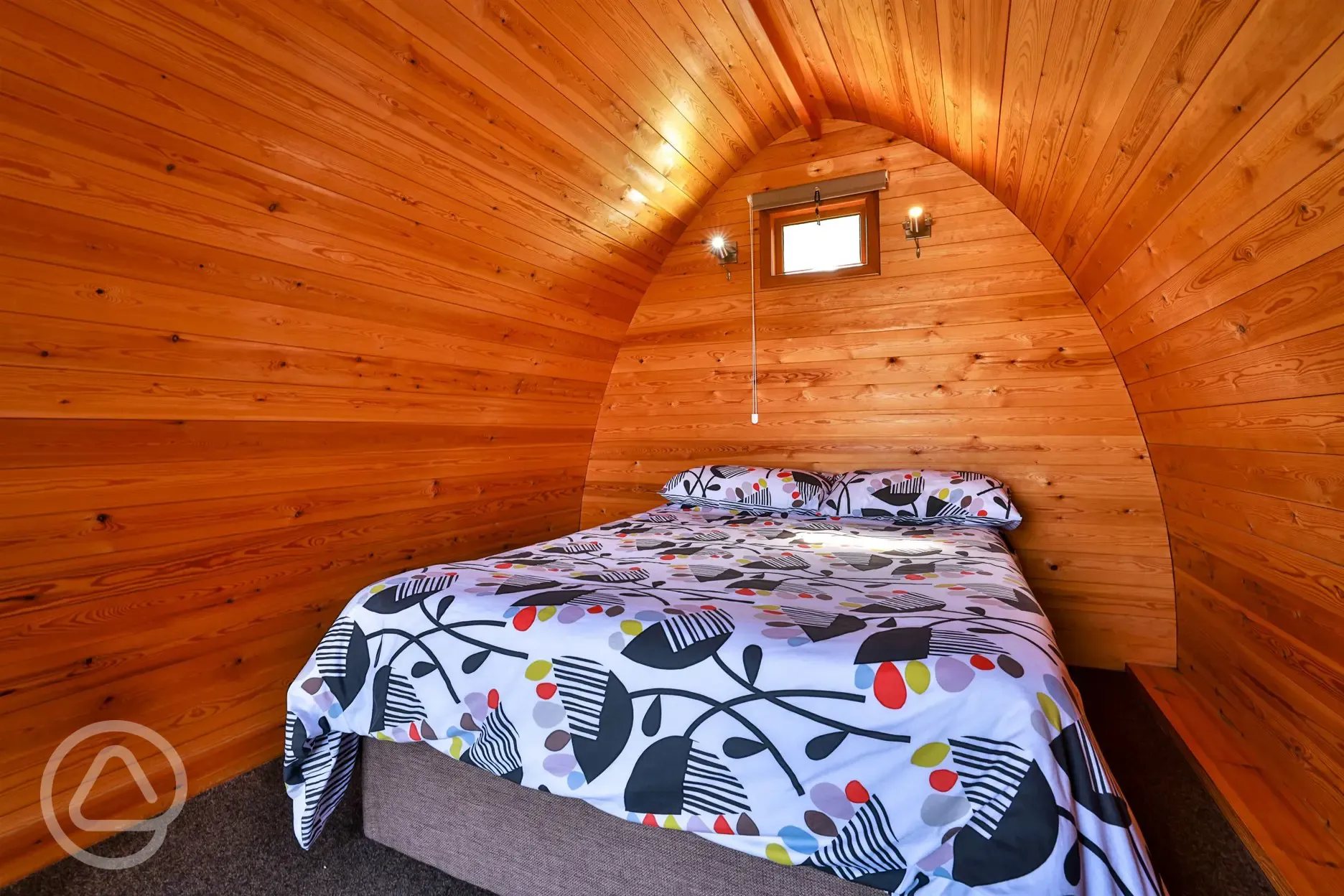 Double bed inside camping pod Double bed inside camping pod