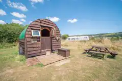 Jeremy Fisher shepherd's hut pod with decking and a picnic table (3.5m x 5.5m) Jeremy Fisher shepherd's hut pod with decking and a picnic table (3.5m x 5.5m)