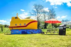 Unique yellow submarine with a BBQ, fire pit and bench Unique yellow submarine with a BBQ, fire pit and bench