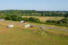 Aerial of the electric grass pitches with countryside views Aerial of the electric grass pitches with countryside views